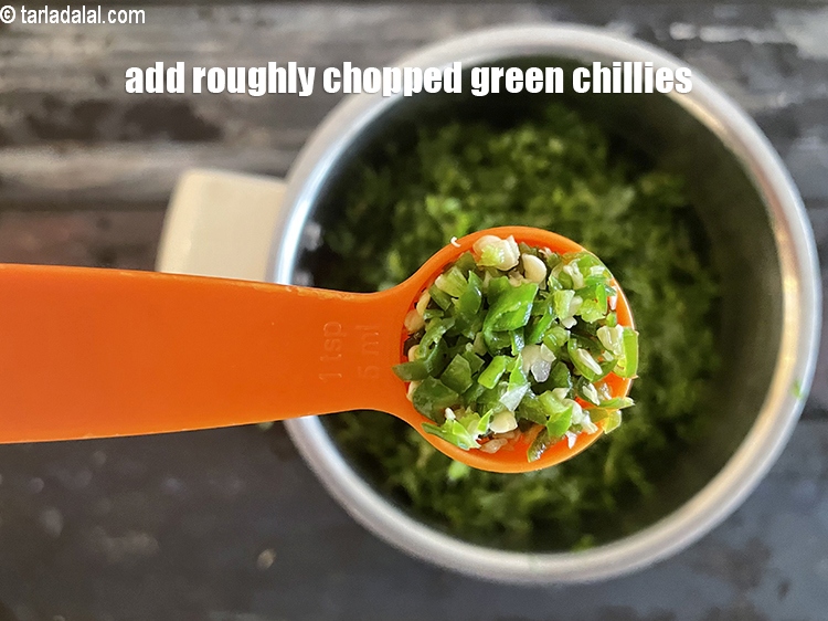 Step 10 – Add&nbsp;2 tsp&nbsp;roughly&nbsp;<a href="https://tarladalal.com/glossary-chopped-green-chilli-820i">chopped green chillies</a>.
