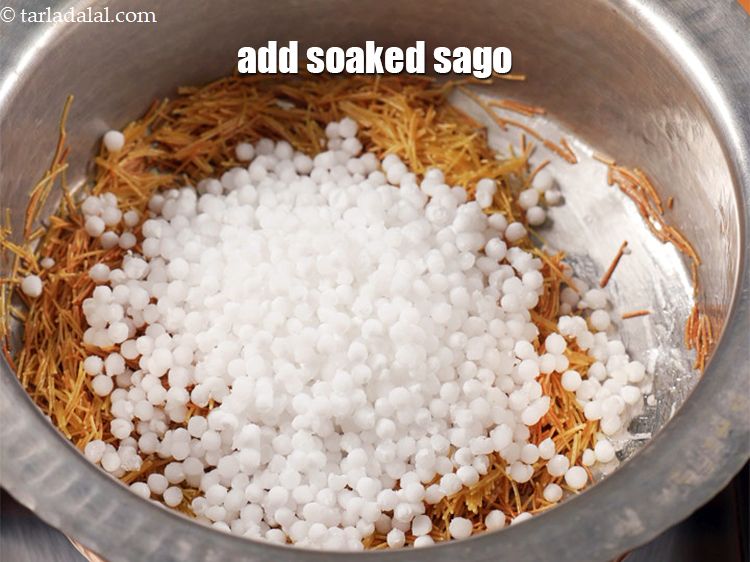Step 5 – Add 1 cup <a href="https://www.tarladalal.com/glossary-soaked-sago-1449i">soaked sago (sabudana)</a>.&nbsp;