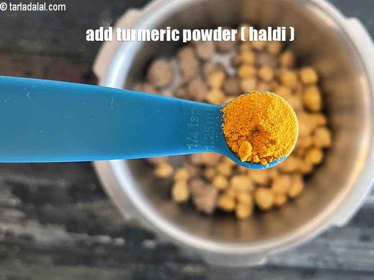 Step 15 – Add&nbsp;<meta charset="UTF-8" />1/4 tsp&nbsp;<a href="glossary-turmeric-powder-haldi-645i">turmeric powder (haldi)</a>.