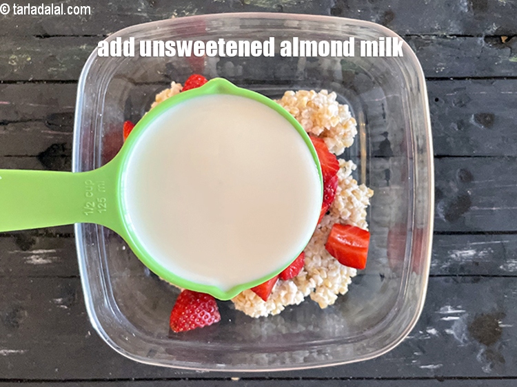 Step 7 – <meta charset="UTF-8" />Add 1/2 cup unsweeetened&nbsp;almonds (badam)&nbsp;milk.&nbsp;