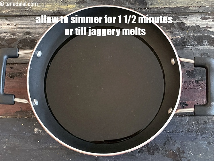 Step 5 – Allow jaggery to simmer for 1&nbsp;1/2 minutes or&nbsp;till the jaggery melts.