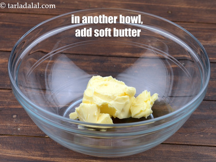 Step 6 – In another bowl, add 1 cup&nbsp;<a href="https://www.tarladalal.com/glossary-soft-butter-naram-makhan-1942i">soft butter</a>.