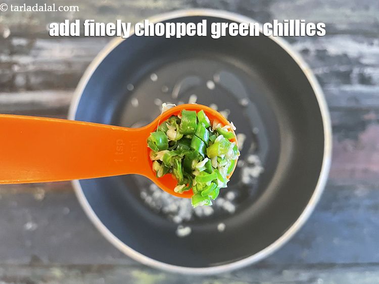 Step 10 – Add&nbsp;<meta charset="UTF-8" />1 tsp&nbsp;finely&nbsp;<a href="glossary-chopped-green-chilli-820i">chopped green chillies</a>.