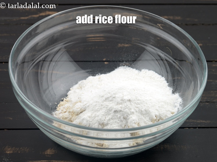 Step 5 – Add 1/4 cup&nbsp;<a href="https://www.tarladalal.com/glossary-rice-flour-chawal-ka-atta-534i">rice flour (chawal ka atta)</a>.