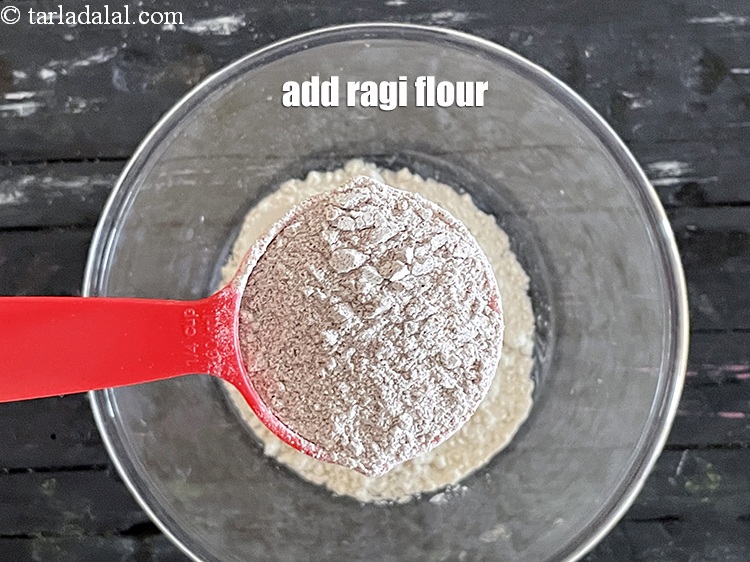 Step 5 – Add&nbsp;<meta charset="UTF-8" />1/4 cup&nbsp;<a href="glossary-ragi-flour-nachni-flour-nachni-ka-atta-red-millet-flour-1115i">ragi (nachni / red millet) flour</a>.