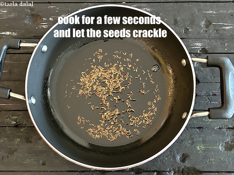 Step 12 – Cook for a few seconds and let the seeds crackle.