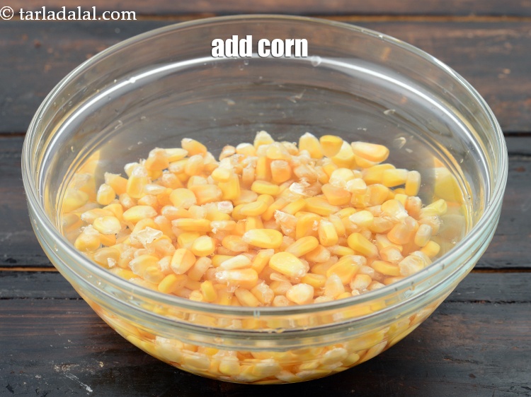 Step 5 – Add 1 cup&nbsp;<a href="https://www.tarladalal.com/glossary-sweet-corn-kernels-makai-ke-dane-156i">sweet corn kernels (makai ke dane)</a>.&nbsp;