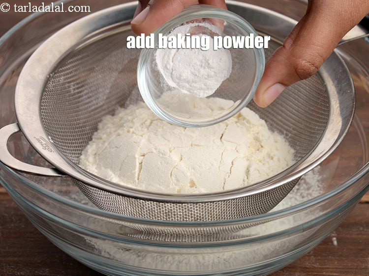 Step 5 – Add &frac12; tsp <a href="https://www.tarladalal.com/glossary-baking-powder-425i">baking powder</a>.