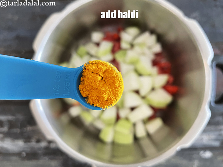 Step 16 – Add&nbsp;<meta charset="UTF-8" />1/4 tsp&nbsp;<a href="glossary-turmeric-powder-haldi-645i">turmeric powder (haldi)</a>.