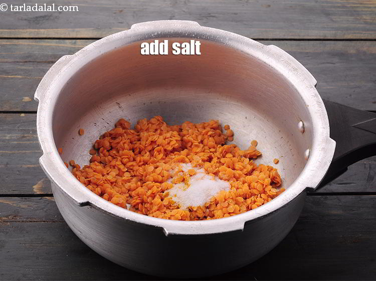 Step 11 – Add the <a href="https://www.tarladalal.com/glossary-salt-namak-table-salt-418i" target="_blank">salt</a>.