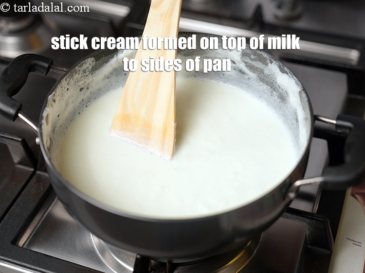 Step 6 – Stick the cream (malai) formed on the top of the milk to the sides of …