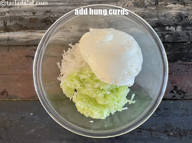 Step 9 – Add&nbsp;<meta charset="UTF-8" />1/2 cup&nbsp;<a href="glossary-thick-curds-2097i">thick curds (dahi)</a>.