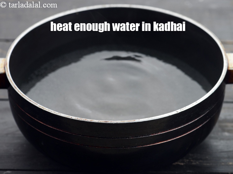 Step 5 – Heat enough water in a kadhai.