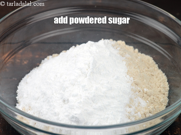 Step 5 – Add 4 tbsp <a href="https://www.tarladalal.com/glossary-powdered-sugar-280i">powdered sugar</a>.