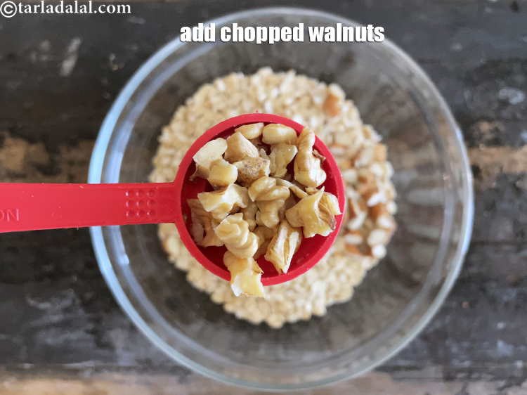 Step 8 – Add 2&nbsp;tbsp&nbsp;<a href="glossary-chopped-walnuts-785i">chopped walnuts (akhrot)</a>.