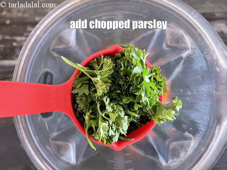 Step 8 – <meta charset="UTF-8" />Add 1/4 cup&nbsp;roughly&nbsp;<a href="glossary-chopped-parsley-793i">chopped parsley</a>&nbsp;stems with leaves.