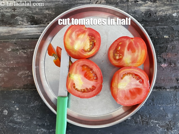 Step 7 – Cut tomaotes in half.
