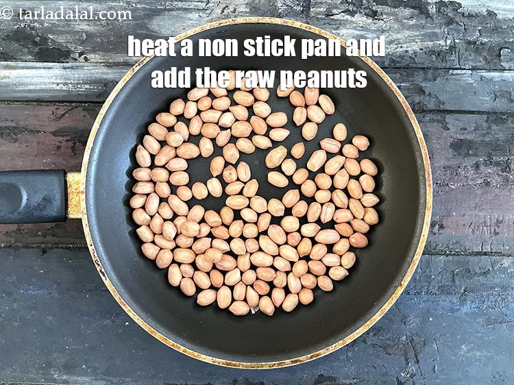 Step 6 – Heat a non stick pan and add the raw peanuts.&nbsp;