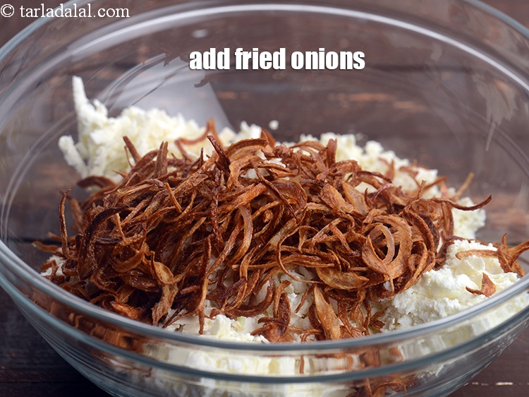 Step 5 – Add 1/2 cup&nbsp;<a href="https://tarladalal.com/glossary-fried-onions-924i">fried onions</a>.