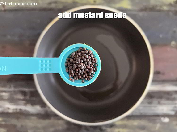 Step 8 – Add&nbsp;<meta charset="UTF-8" />1/2 tsp&nbsp;<a href="glossary-mustard-seeds-sarson-rai-sarson-ke-beej-525i">mustard seeds ( rai / sarson)</a>.