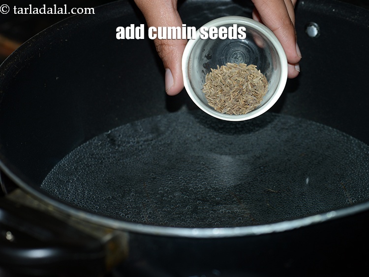 Step 5 – Add 1 tsp <a href="https://www.tarladalal.com/glossary-cumin-seeds-jeera-zeera-381i">cumin seeds (jeera)</a>.