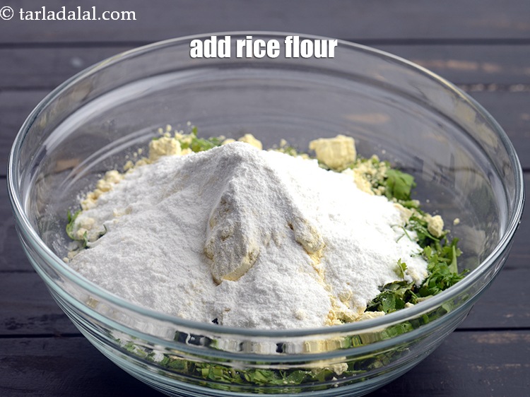 Step 5 – Add &frac14; cup <a href="https://www.tarladalal.com/glossary-rice-flour-chawal-ka-atta-534i">rice flour (chawal ka atta)</a>.