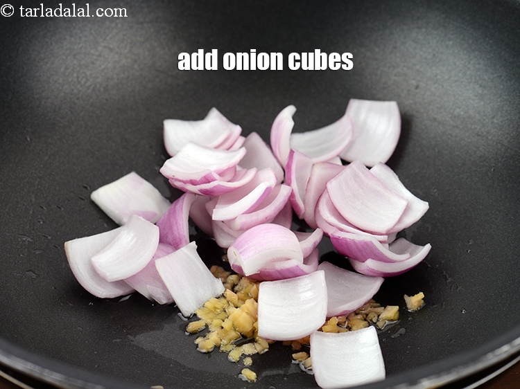Step 5 – Add 1/2 cup <a href="https://www.tarladalal.com/glossary-onion-cubes-732i">onion cubes</a>.