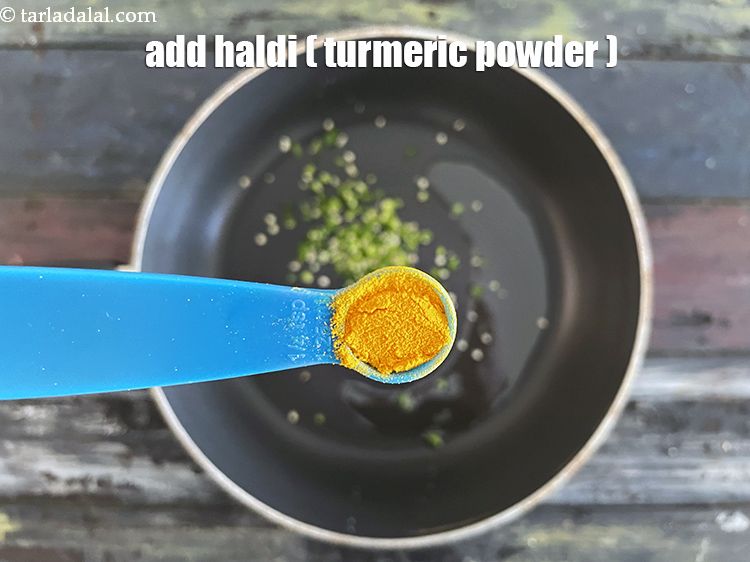 Step 23 – Add&nbsp;<meta charset="UTF-8" />1/4 tsp&nbsp;<a href="glossary-turmeric-powder-haldi-645i">turmeric powder (haldi)</a>.