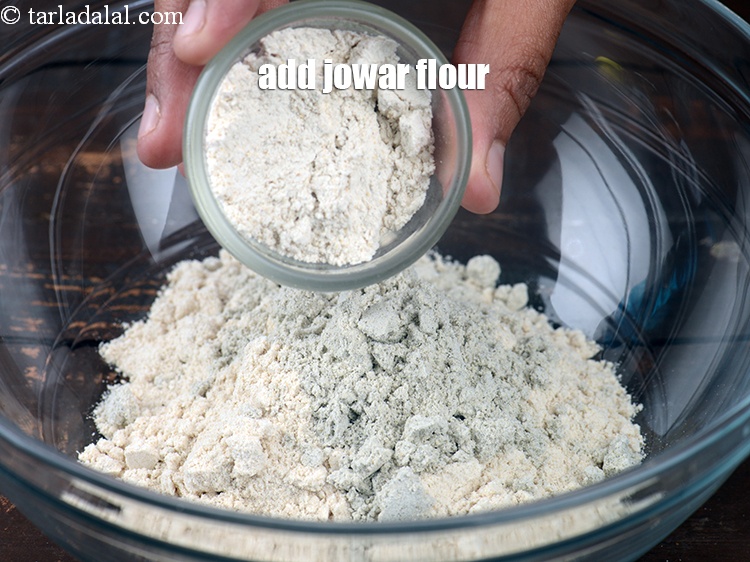 Step 5 – Add 2 tbsp&nbsp;<a href="https://www.tarladalal.com/glossary-jowar-flour-jowar-ka-atta-white-millet-flour-sorghum-flour-483i">jowar (white millet) flour</a>.&nbsp;