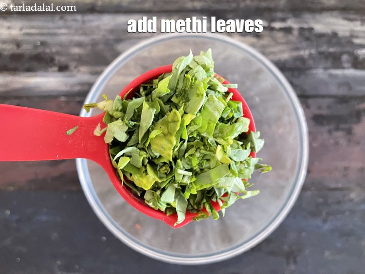 Step 7 – Add&nbsp;<meta charset="UTF-8" />1/4 cup&nbsp;finely&nbsp;<a href="glossary-chopped-fenugreek-811i">chopped fenugreek (methi) leaves</a>.