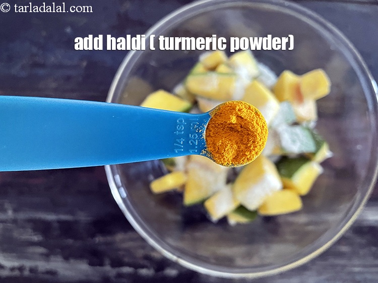 Step 13 – Add&nbsp;1/2 tsp&nbsp;<a href="https://tarladalal.com/glossary-turmeric-powder-haldi-645i">turmeric powder (haldi)</a>.