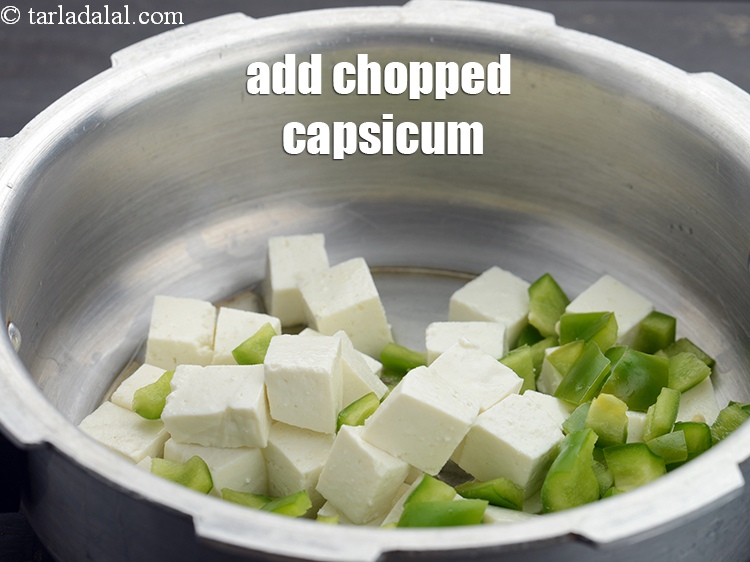 Step 8 – Add 1/4 cup&nbsp;<a href="https://www.tarladalal.com/glossary-chopped-capsicum-164i">chopped capsicum</a>.
