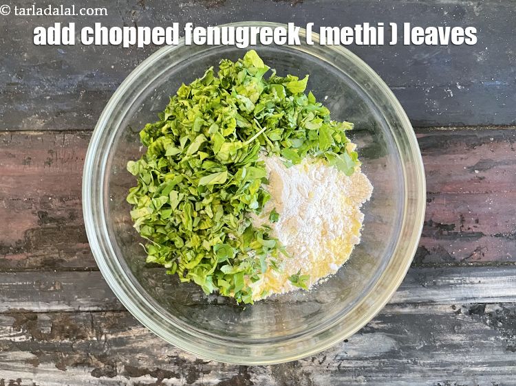 Step 7 – Add&nbsp;1/2 cup&nbsp;<a href="glossary-chopped-fenugreek-811i">chopped fenugreek (methi) leaves</a>.