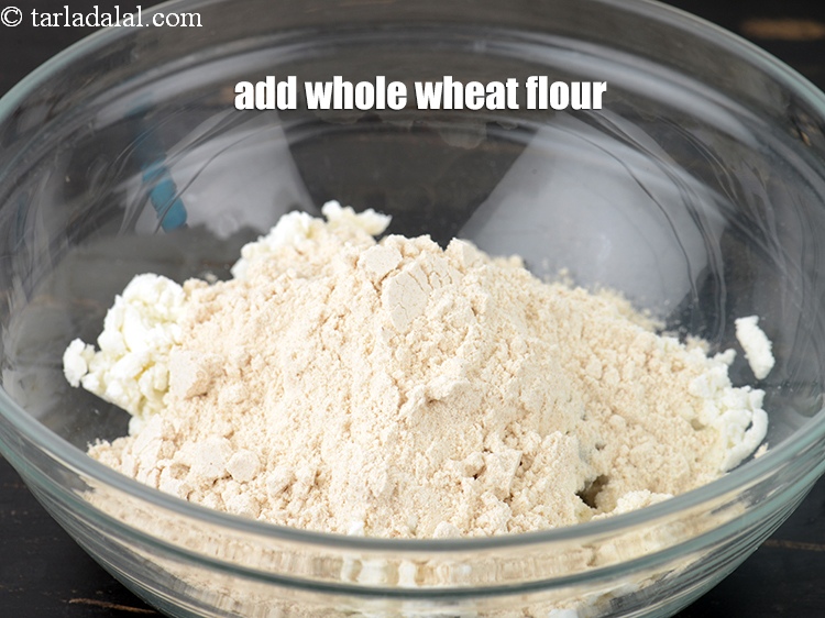 Step 5 – Add 1/2 cup <a href="https://www.tarladalal.com/glossary-whole-wheat-flour-gehun-ka-atta-gehun-ka-aata-429i">whole wheat flour (gehun ka atta)</a>.