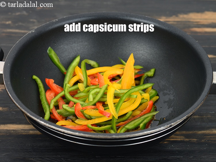 Step 12 – Add&nbsp;<meta charset="UTF-8" />1 cup&nbsp;<a href="glossary-capsicum-strips-2313i">capsicum strips</a>.