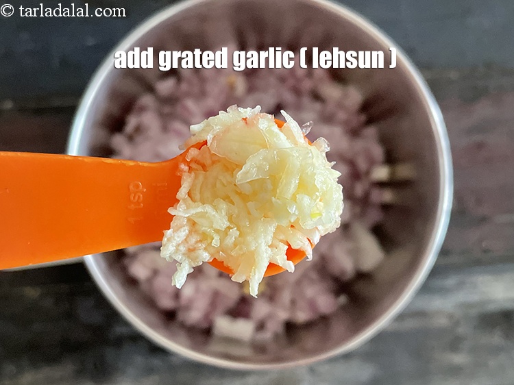 Step 12 – Add&nbsp;<meta charset="UTF-8" />1 tsp&nbsp;<a href="glossary-grated-garlic-859i">grated garlic (lehsun)</a>.