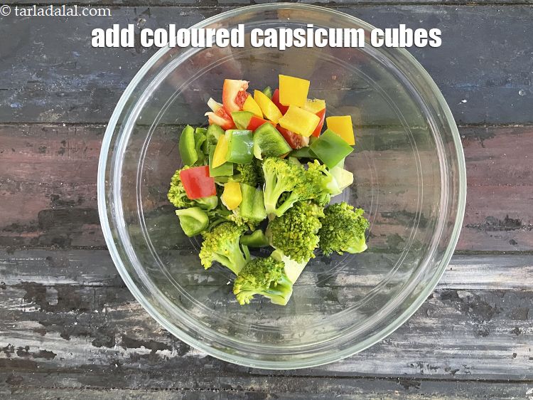 Step 19 – Add&nbsp;1/2 cup&nbsp;colored&nbsp;<a href="glossary-capsicum-cubes-170i">capsicum cubes</a>.