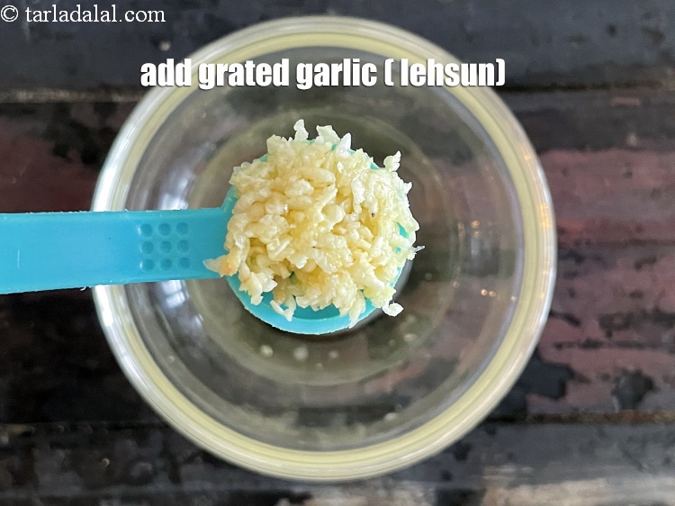 Step 10 – Add&nbsp;<meta charset="UTF-8" />1tsp&nbsp;<a href="glossary-grated-garlic-859i">grated garlic (lehsun)</a>.
