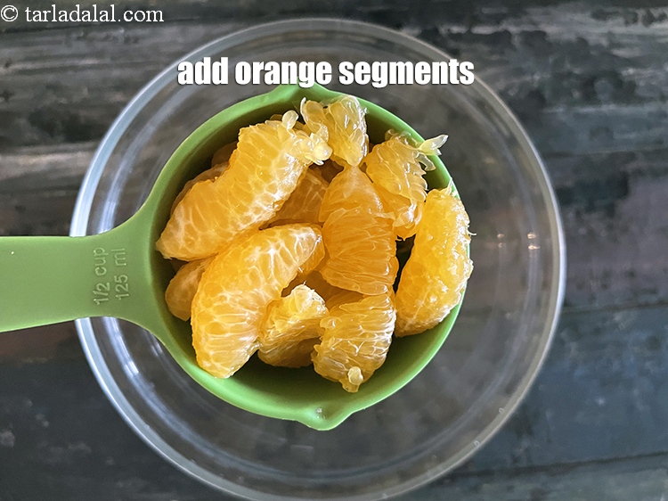 Step 14 – Add&nbsp;<meta charset="UTF-8" />1/2 cup&nbsp;<a href="glossary-orange-segments-116i">orange segments</a>&nbsp;, peeled.