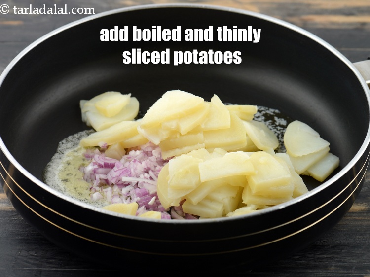 Step 5 – Add 1 cup&nbsp;<a href="https://www.tarladalal.com/glossary-boiled-and-peeled-potato-slices-2223i">boiled and thinly sliced potatoes</a>.