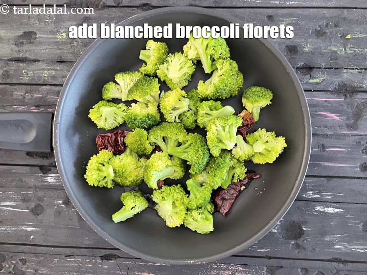 Step 24 – Add&nbsp;<meta charset="UTF-8" />1 1/2 cups&nbsp;<a href="glossary-blanched-broccoli-florets-719i">blanched broccoli florets</a>.