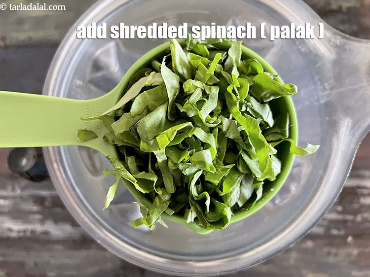 Step 6 – Add&nbsp;<meta charset="UTF-8" />1/2 cup&nbsp;<a href="glossary-shredded-spinach-777i">shredded spinach (palak)</a>.