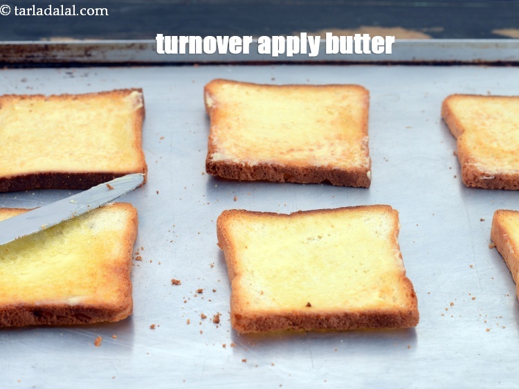 Step 5 – Turnover the toasted bread slices, apply 1 tsp butter on each bread slice.&nbsp;