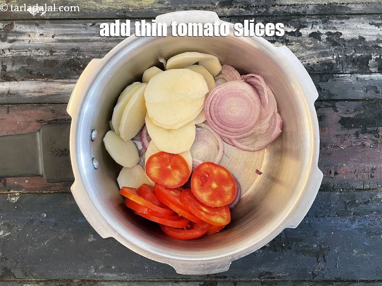 Step 5 – Add&nbsp;1/2 cup&nbsp;thin&nbsp;<a href="glossary-tomato-slices-1823i">tomato slices</a>.&nbsp;Tomatoes&nbsp;are extremely rich source of&nbsp;<a href="https://www.tarladalal.com/recipes-for-Lycopene-Diet-1175">Lycopene</a>. Tomatoes are a powerful antioxidant, super …