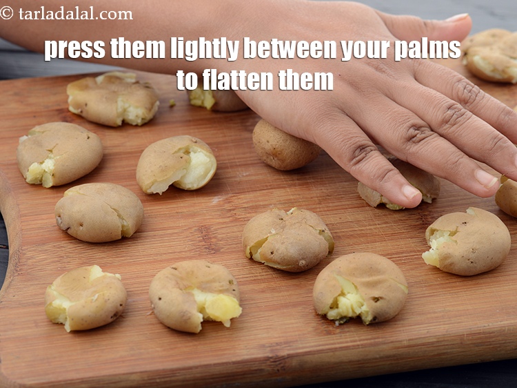Step 5 – Now press them lightly between your palms to flatten them.&nbsp;