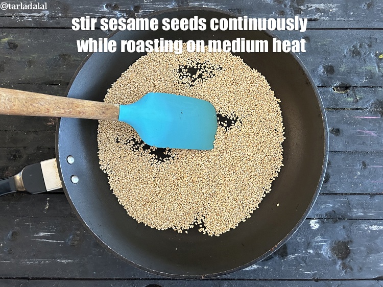 Step 5 – Stir sesame seeds&nbsp;continuously while roasting on medium heat.