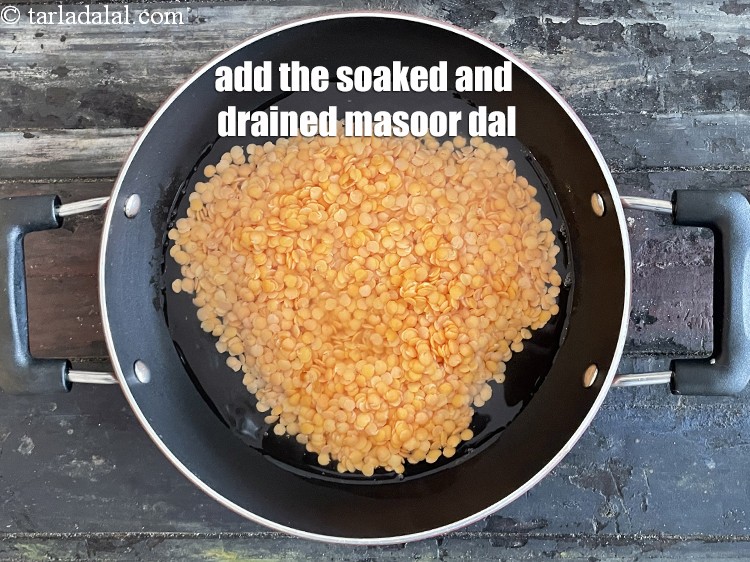 Step 12 – Add the soaked and drained masoor dal.