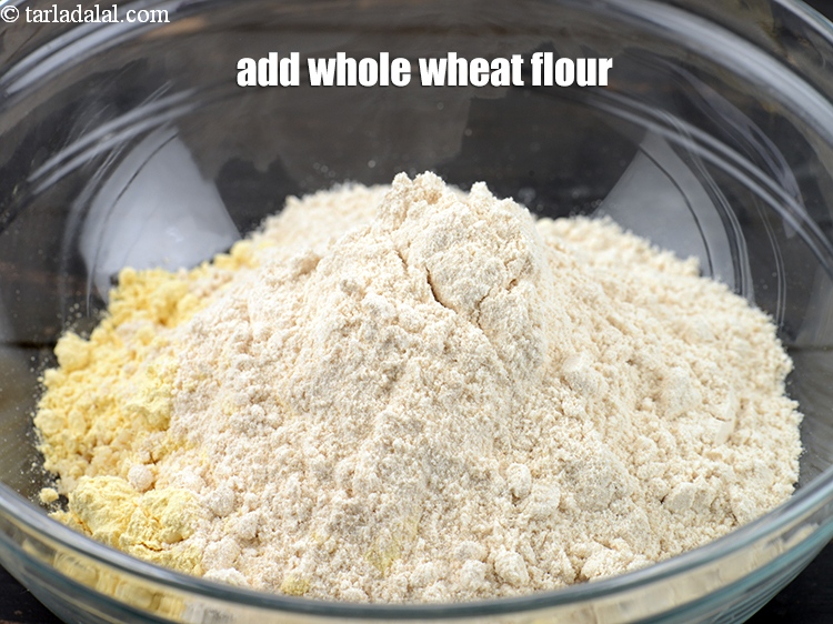 Step 5 – Add 5 tbsp&nbsp;<a href="https://www.tarladalal.com/glossary-whole-wheat-flour-gehun-ka-atta-gehun-ka-aata-429i">whole wheat flour (gehun ka atta)</a>.