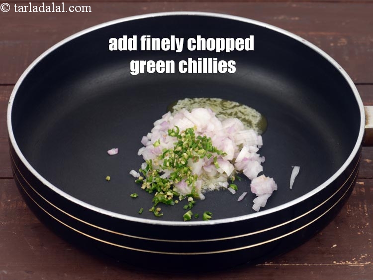 Step 5 – Add 1 tsp finely <a href="https://www.tarladalal.com/glossary-chopped-green-chilli-820i">chopped green chillies</a>.
