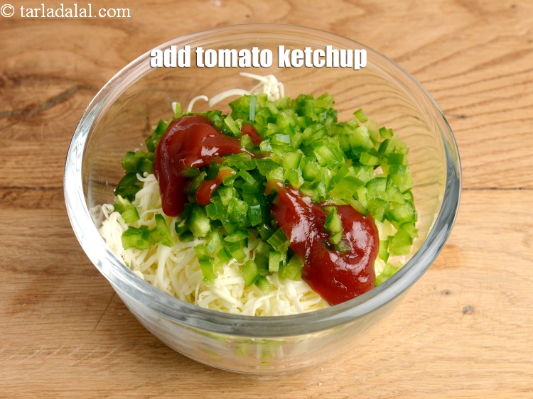 Step 5 – Add 1 &frac12; tbsp <a href="https://www.tarladalal.com/glossary-tomato-ketchup-tomato-sauce-181i">tomato ketchup</a>.